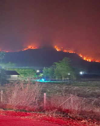 Sangthong District Hit Hard by Forest Fires, Over 1,400 Hectares Destroyed